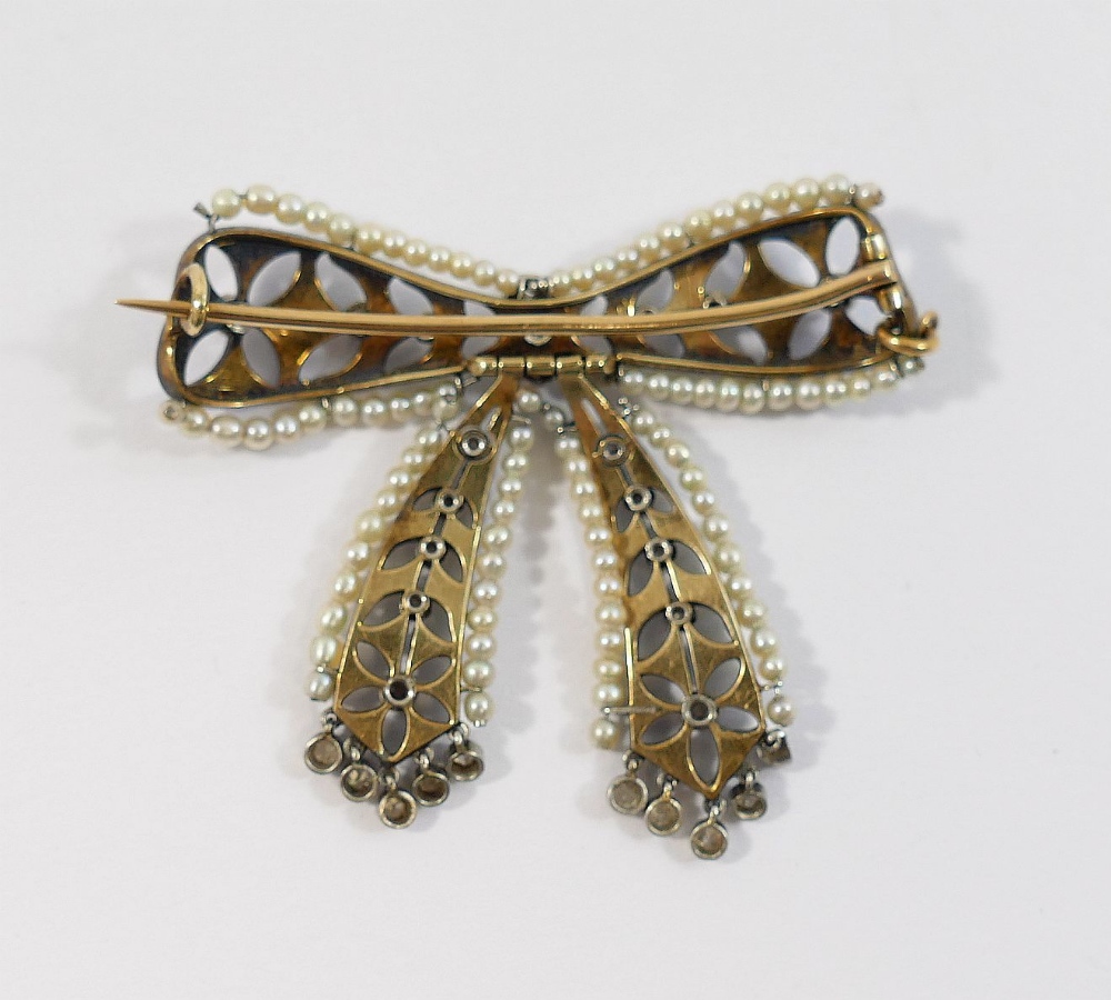 A French Belle Epoch enamel, seed pearl and diamond set bow brooch, the pale blue guilloche enamel - Image 2 of 3