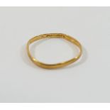 A 22 carat gold wedding band, Birmingham 1936, finger size L, slightly misshapen, 1g CONDITION