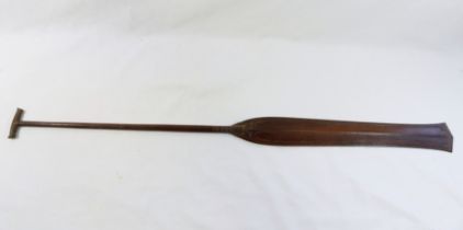 A ceremonial carved wooden Dayak canoe paddle from Borneo, Indonesia, 80.5cm long CONDITION