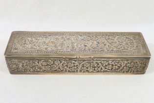 A small Indian rectangular box with hinged lid, all-over foliate decoration and gilt interior, 12.