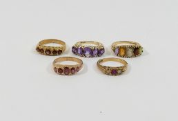 Five 9 carat gold gem-set rings, including three five-stone carved half hoop rings, a smaller five