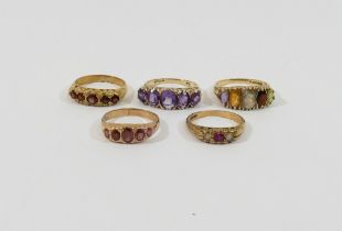 Five 9 carat gold gem-set rings, including three five-stone carved half hoop rings, a smaller five