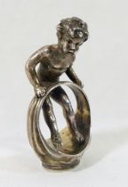 A Continental silver seal modelled as a cherub standing on a signet ring by Berthold Muller,  with