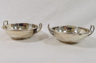 A pair of small silver two-handled dishes, Birmingham 1942, 8.3cm diameter, combined weight 2.33ozt,