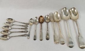 Twelve assorted silver spoons and one silver dessert fork, combined weight 11.25ozt, 350g
