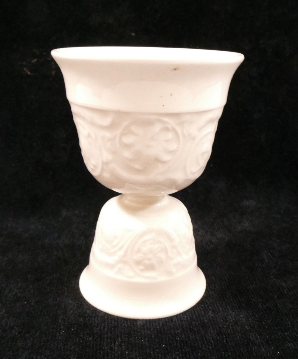 A Wedgwood Barlaston double eggcup, decorated with impressed scrolling foliate design, 10.5cm high - Image 2 of 3
