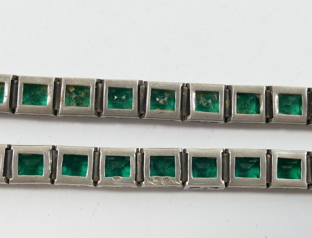 A pair of vintage French emerald paste tennis bracelets, with wild boar's head .800 standard - Image 2 of 3