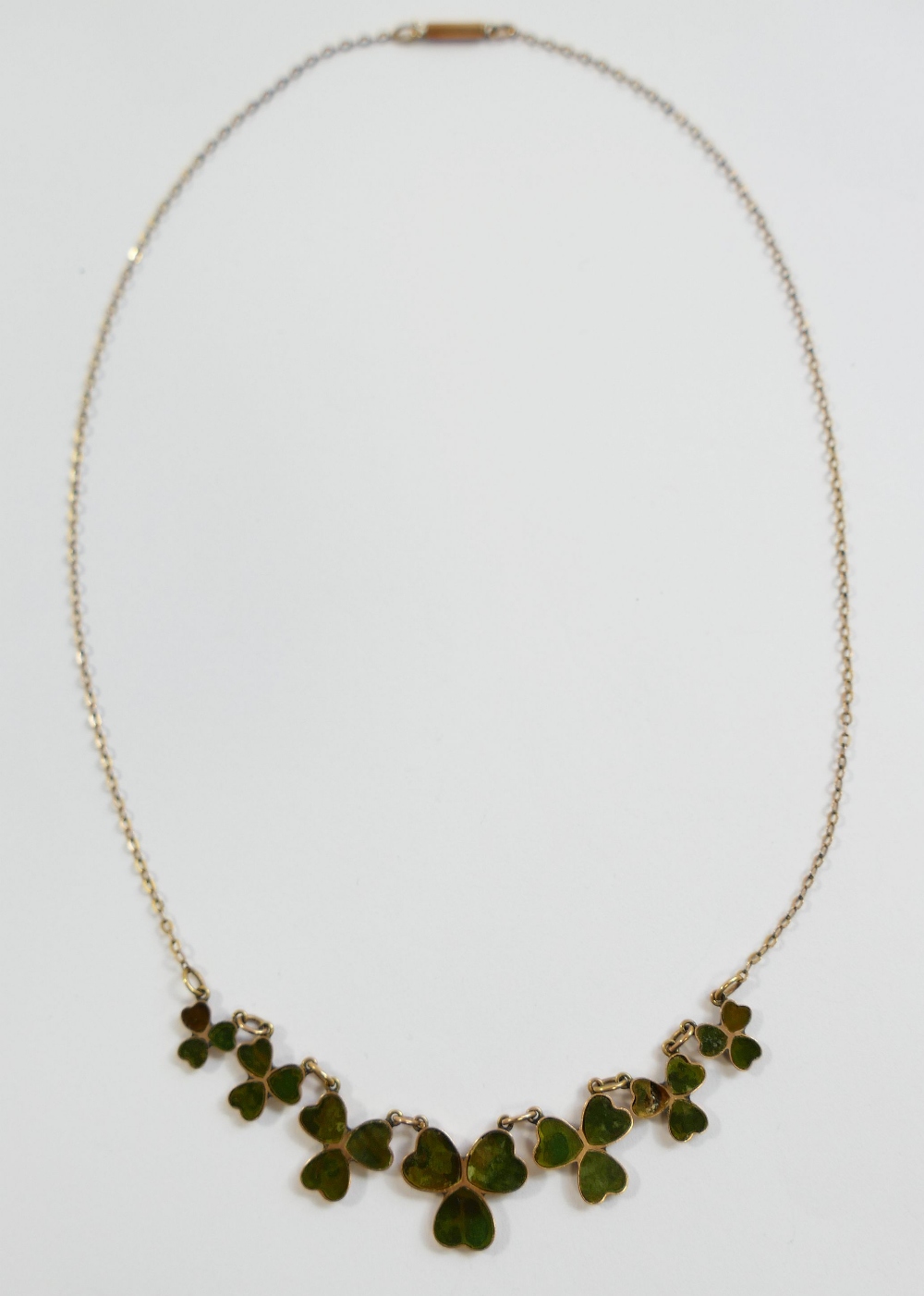 An Edwardian Connemara marble set shamrock necklace, the seven graduated shamrocks with closed - Image 2 of 3