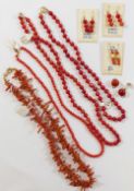 Assorted coral jewellery including three strings of cylindrical beads and one coral branch necklace,