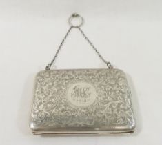 An early 20th century ladies rectangular  hinged silver purse, Birmingham 1911, with all-over