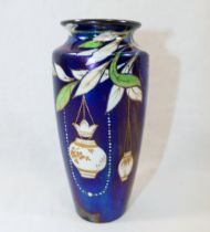 A Shelley lustre vase, decorated leaves and hanging vases, 15.5cm high CONDITION REPORTS & PAYMENT