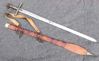 A Sudanese Kaskana sword with leather covered scabbard, 108cm long overall CONDITION REPORTS &