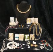 An Italian style gold plated collar necklace and matching clip on earrings, and other gold plated
