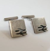 A pair of British Rail square silver cuff links, London 1992, 1.7cm x 1.7cm with bar backs, 0.68ozt,