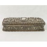 An Edwardian silver rectangular lidded box, London 1903, with hinged lid, all over embossed