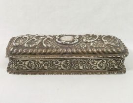 An Edwardian silver rectangular lidded box, London 1903, with hinged lid, all over embossed