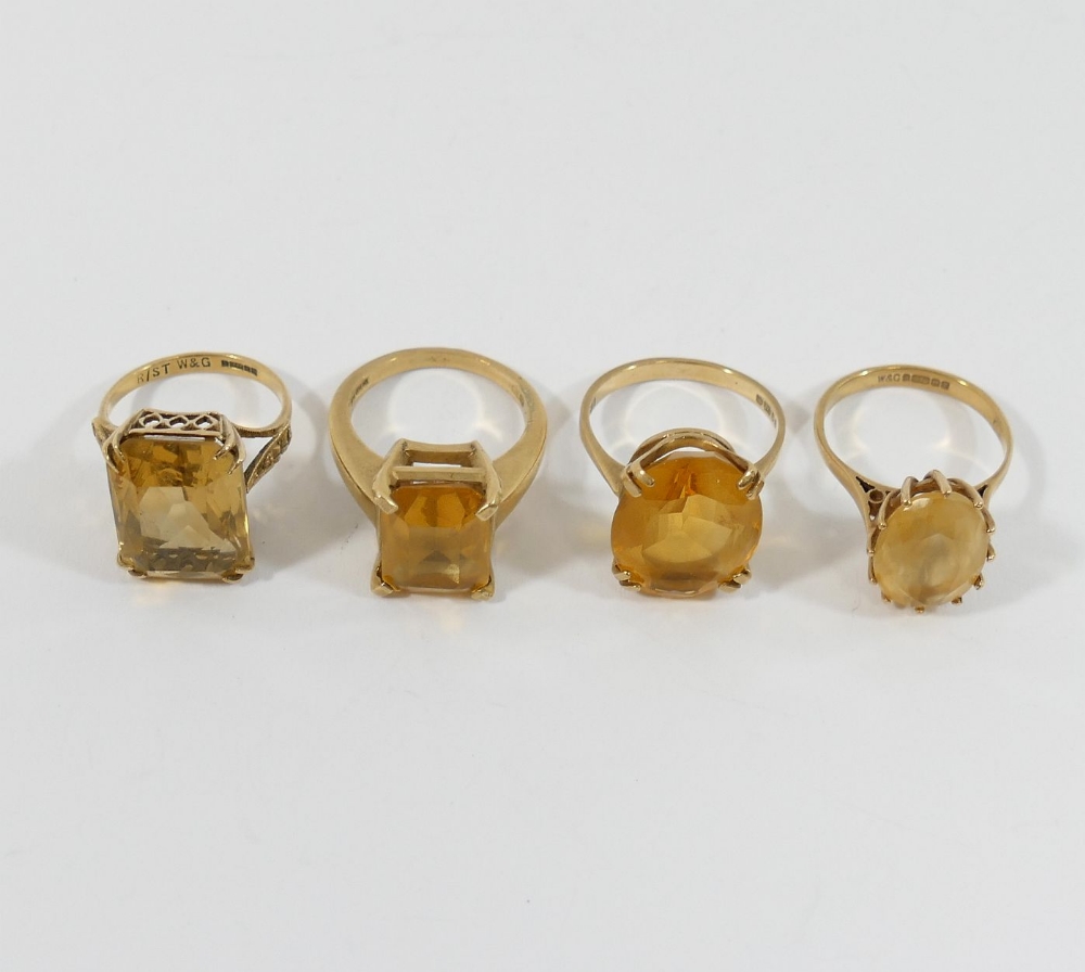 Six 9 carat gold single stone rings, set with smokey quartz and citrine, combined weight 24.6g gross - Image 2 of 5