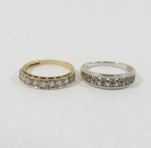 A 9 carat gold cubic zirconia set half eternity ring, Birmingham 1986, finger size Q, and a 9