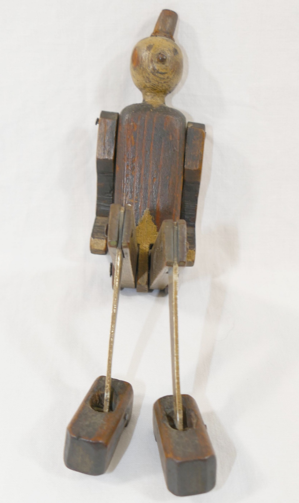 A  scratch built wooden Pinocchio puppet, with hinged arms, legs and feet, 26cm long, with broken - Image 2 of 5