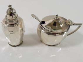 A silver mustard pot and pepperette, Sheffield 1929 by Gladwin Ltd, with unassociated silver salt
