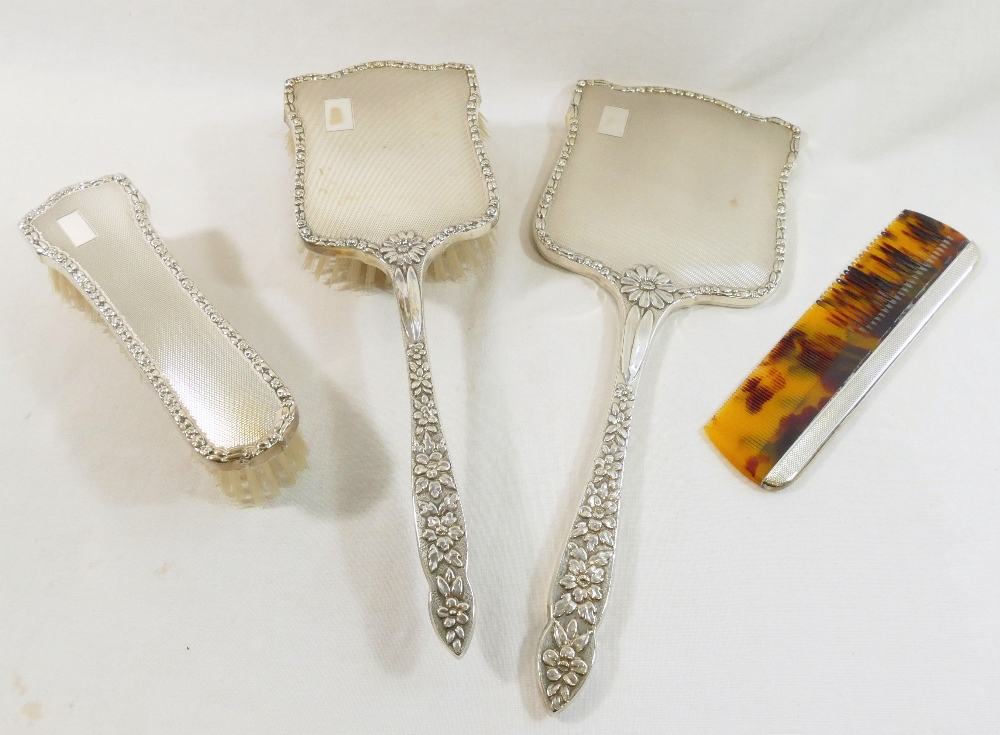 A silver backed dressing table set, comprised of a long handled hair brush, a smaller hair brush, - Image 3 of 4