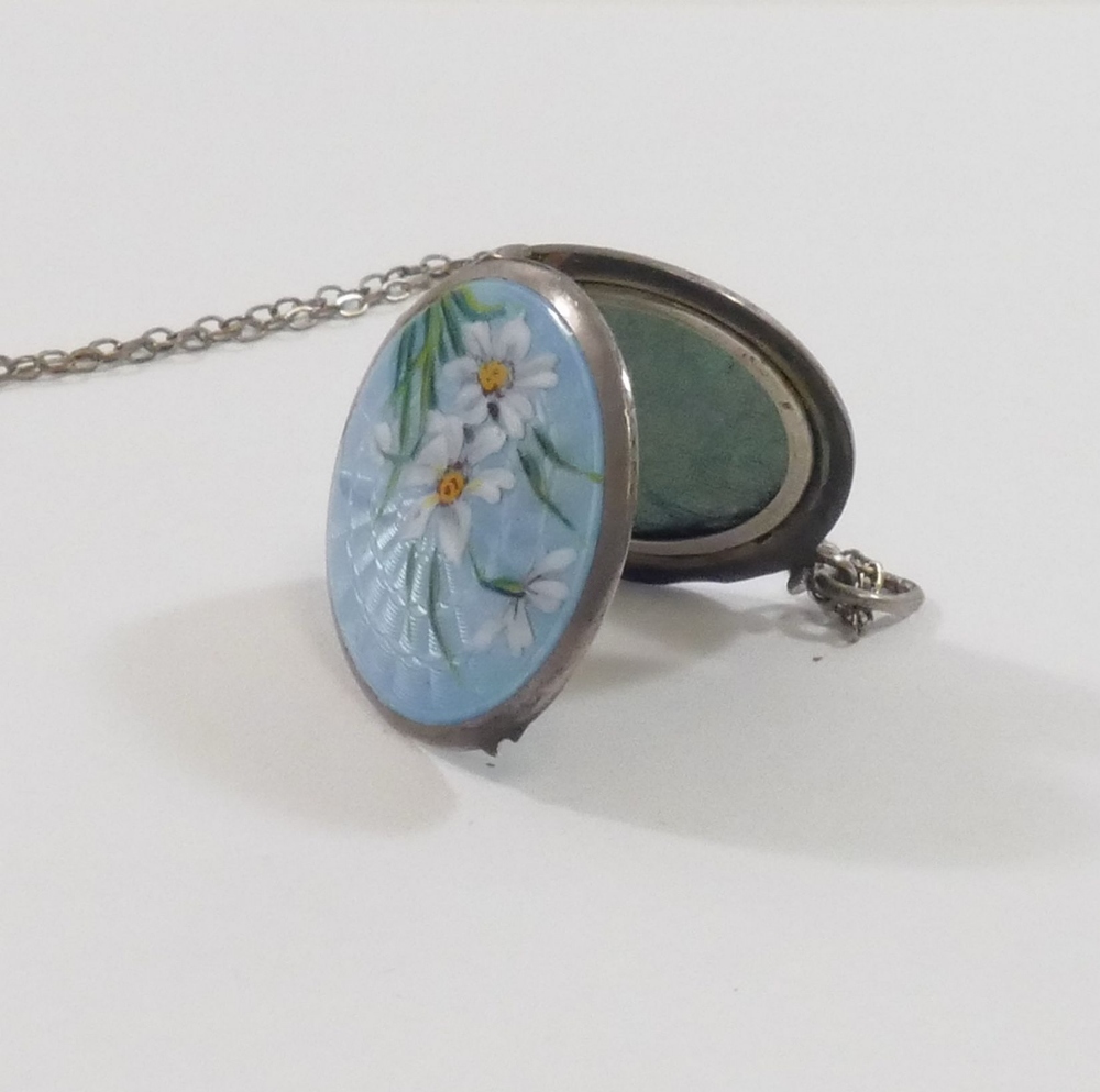 An early 20th century circular guilloche enamel locket, the powder blue ground hand painted with - Image 3 of 3