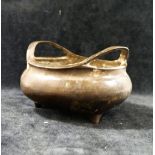 A Chinese Xuande-style bronze two-handled censor/incense burner, raised on three legs  with 16