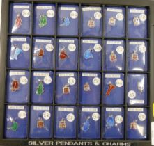 24 enamel charms of counties such as Dorset, Hampshire, Cornwall and Somerset and other souvenir