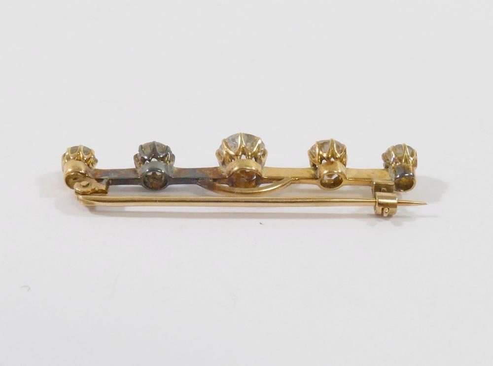 A diamond five-stone bar brooch, the centre old-cut stone approximately 0.50 carats, the remaining - Image 3 of 3