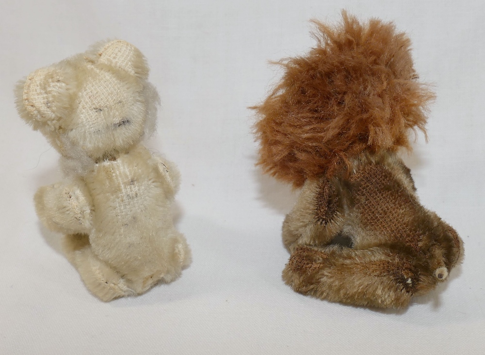 A miniature Steiff lion, 9.5cm long, and a faded miniature Steiff tiger, 9cm long, tail lacking - Image 3 of 3