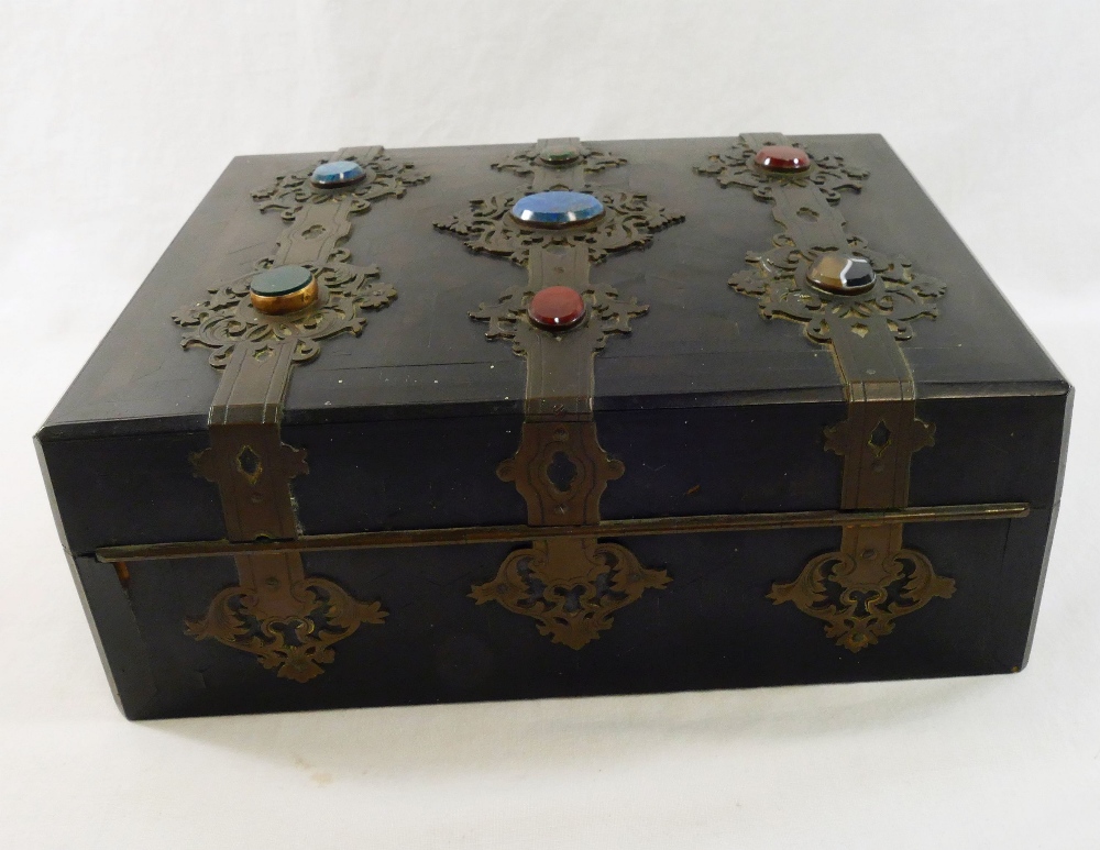 A Victorian parquetry brass bound writing slope, with ornate brass bindings set with hardstone