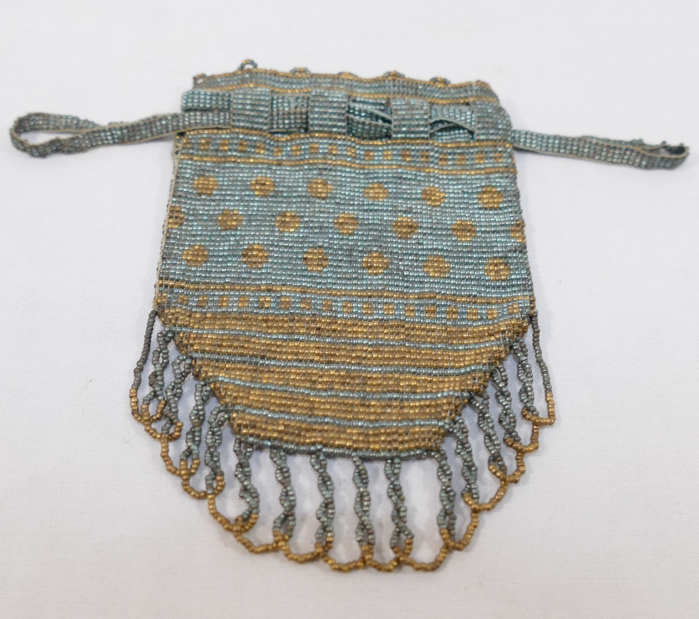 A 19th century cut steel beaded coin/sovereign purse, with drawer string top, 11.5cm long x 7.5cm - Image 2 of 2