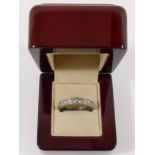 A diamond half eternity ring, the ten round brilliant cut stones each approximately 0.10 carats, set