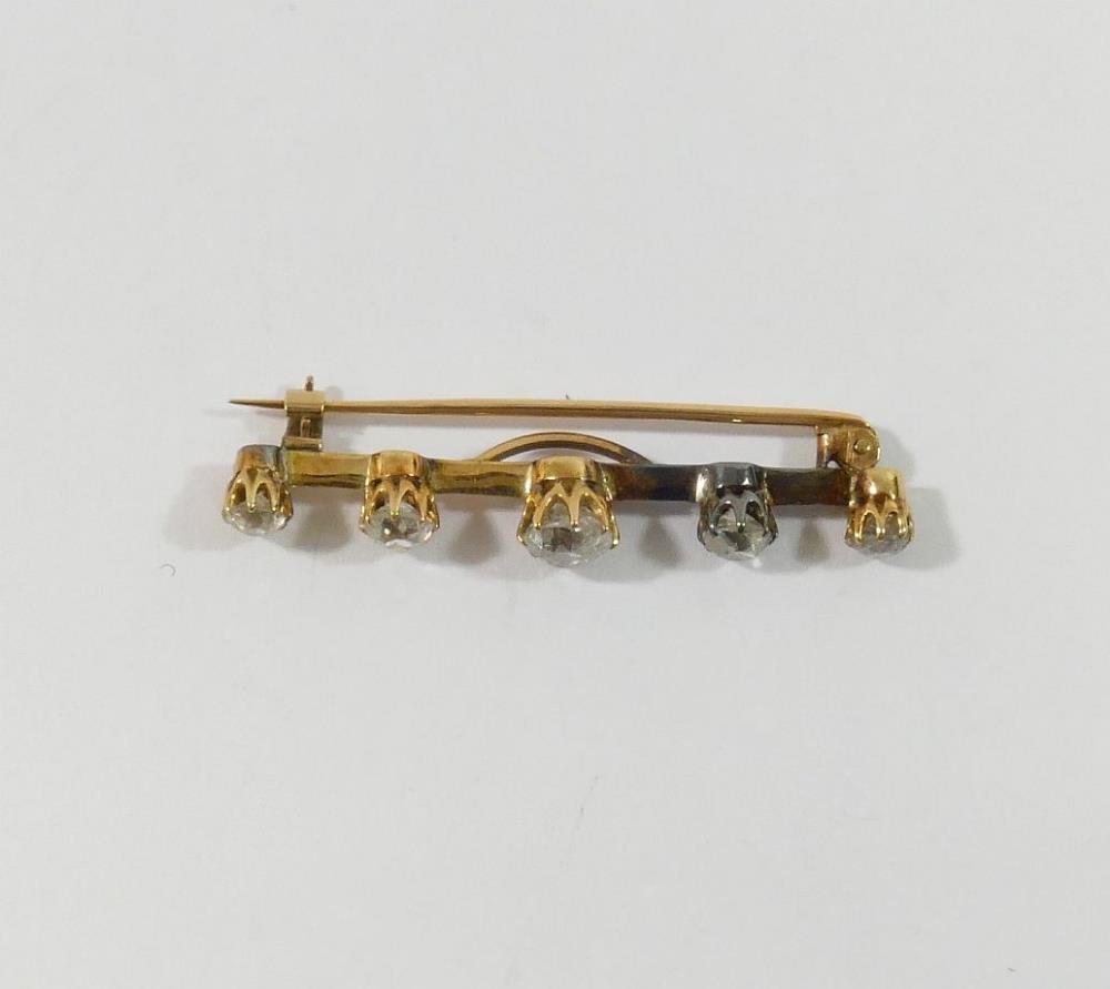 A diamond five-stone bar brooch, the centre old-cut stone approximately 0.50 carats, the remaining - Image 2 of 3