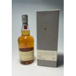 A bottle of The Edinburgh Malt Glenkinchie Single Malt Scotch Whisky, aged 12 years, distilled at