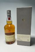 A bottle of The Edinburgh Malt Glenkinchie Single Malt Scotch Whisky, aged 12 years, distilled at