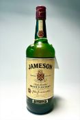 A bottle of Jameson Triple Distilled Irish Whiskey, matured and bottled in Ireland by John