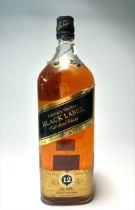A bottle of Johnnie Walker Black Label Old Scotch Whisky, ”Extra Special,” distilled, blended and