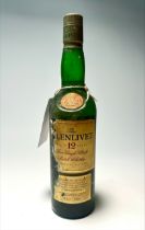 A bottle of Glenlivet Pure Single Malt Scotch Whisky, aged 12 years, distilled in Scotland,