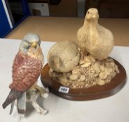 A Goebel German model porcelain group of an eagle together with a pair of partridges (beak