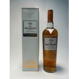 A bottle of The Macallan Amber Highland Single Malt Scotch Whisky, ‘Exclusively matured in sherry