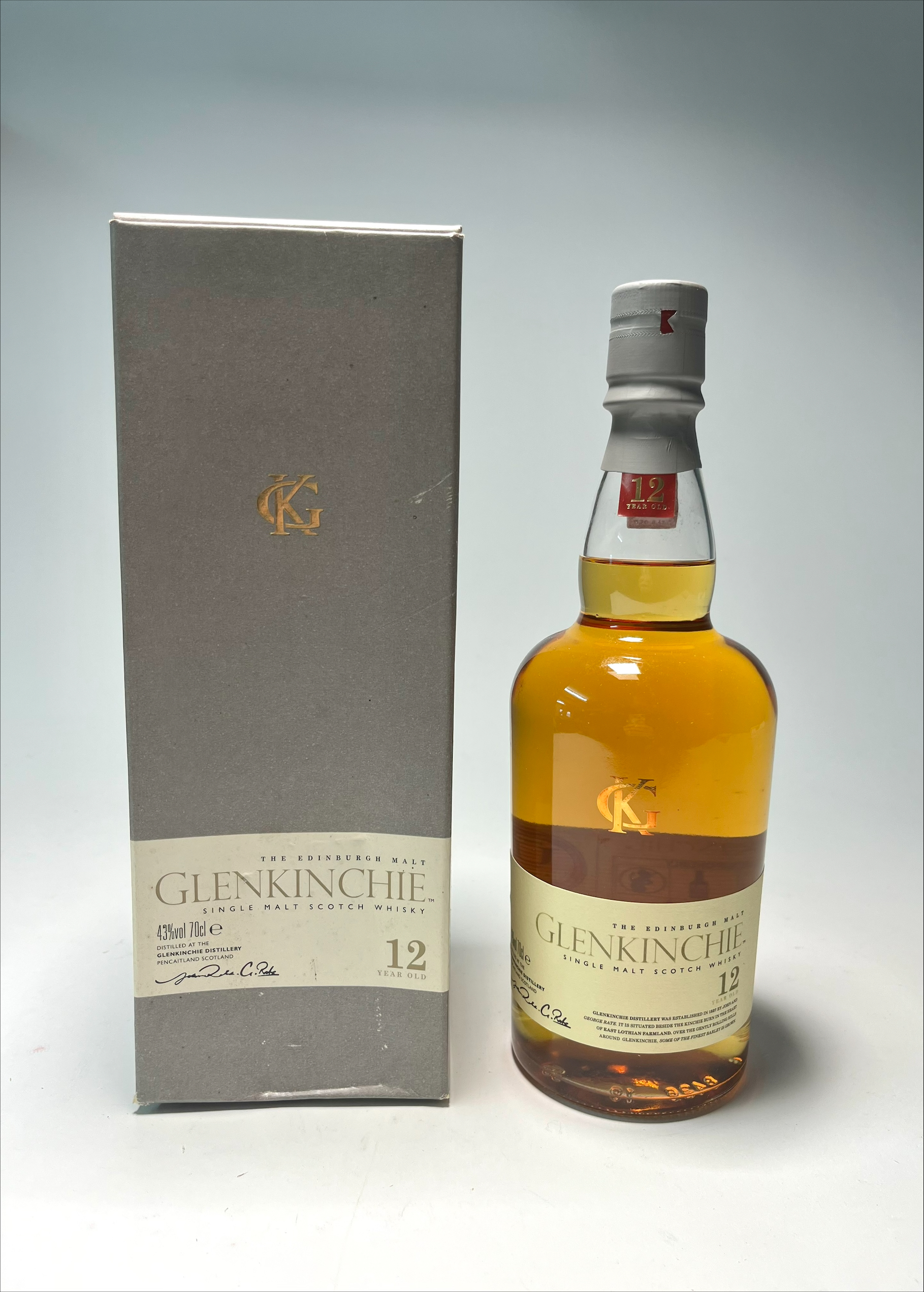 A bottle of The Edinburgh Malt Glenkinchie Single Malt Scotch Whisky, aged 12 years, distilled at