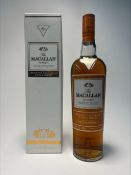 A bottle of The Macallan Amber Highland Single Malt Scotch Whisky, ‘Exclusively matured in sherry