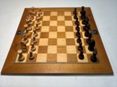 A replica chess set of the classical World Chess Championship in 2004, Centro Dannemann, signed by