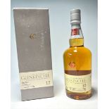 A bottle of The Edinburgh Malt Glenkinchie Single Malt Scotch Whisky, aged 12 years, distilled at