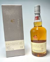 A bottle of The Edinburgh Malt Glenkinchie Single Malt Scotch Whisky, aged 12 years, distilled at