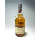A bottle of The Edinburgh Malt Glenkinchie Single Malt Scotch Whisky, aged 12 years, distilled at