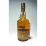A bottle of Glenkinchie Lowland Single Malt Scotch Whisky, aged 10 years, distilled at the