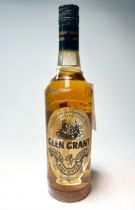 A bottle of Glen Grant Highland Malt Scotch Whisky, distilled by Glen Grant Distillery Company,