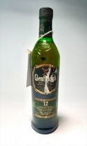 A bottle of Glenfiddich Single Malt Scotch Whisky (est. 1887), aged 12 years, “Distilled and matured